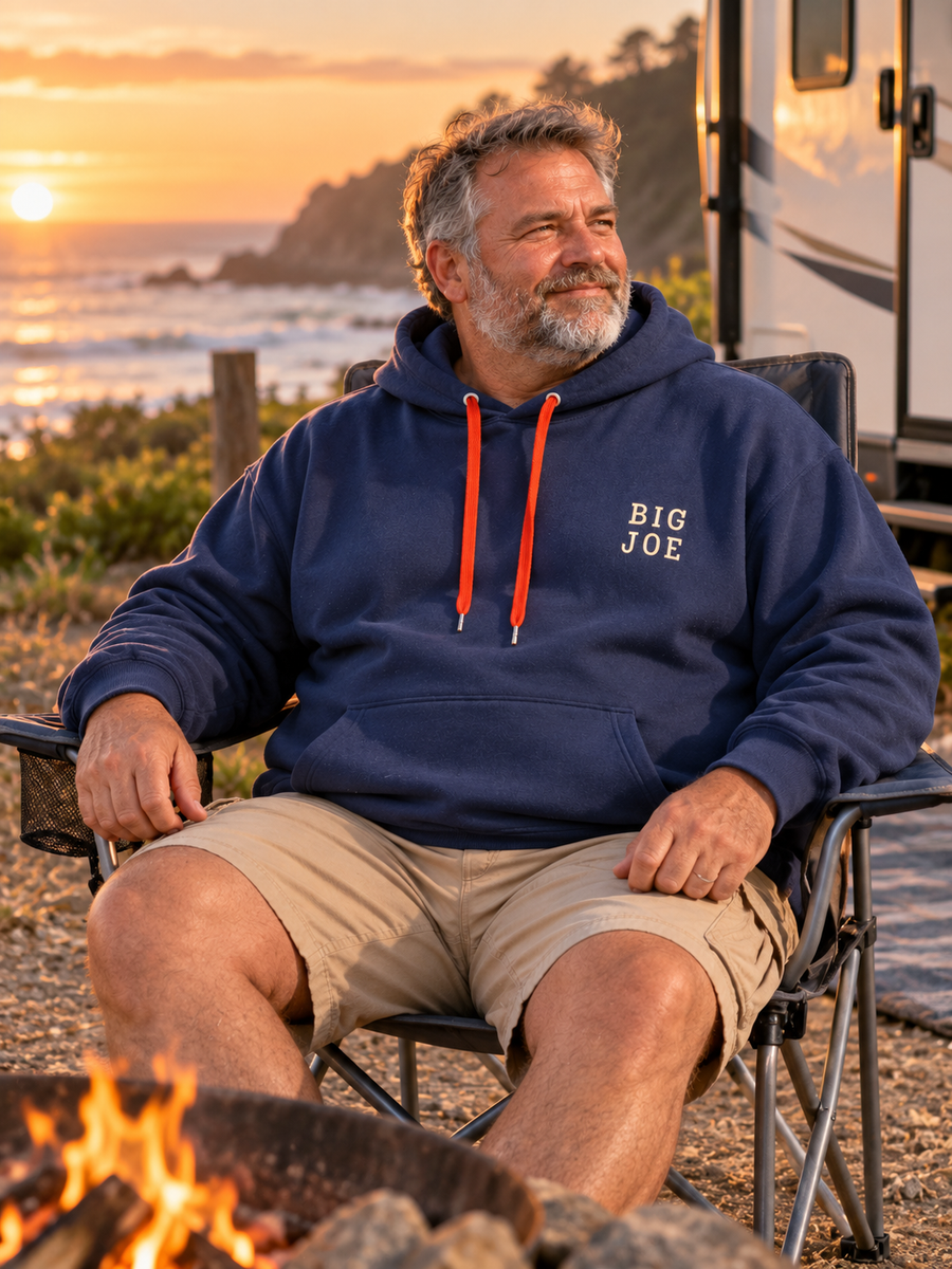 Second Wave Big Joe Navy Hoodie — Men's XXL — mature model in a relaxed coastal setting