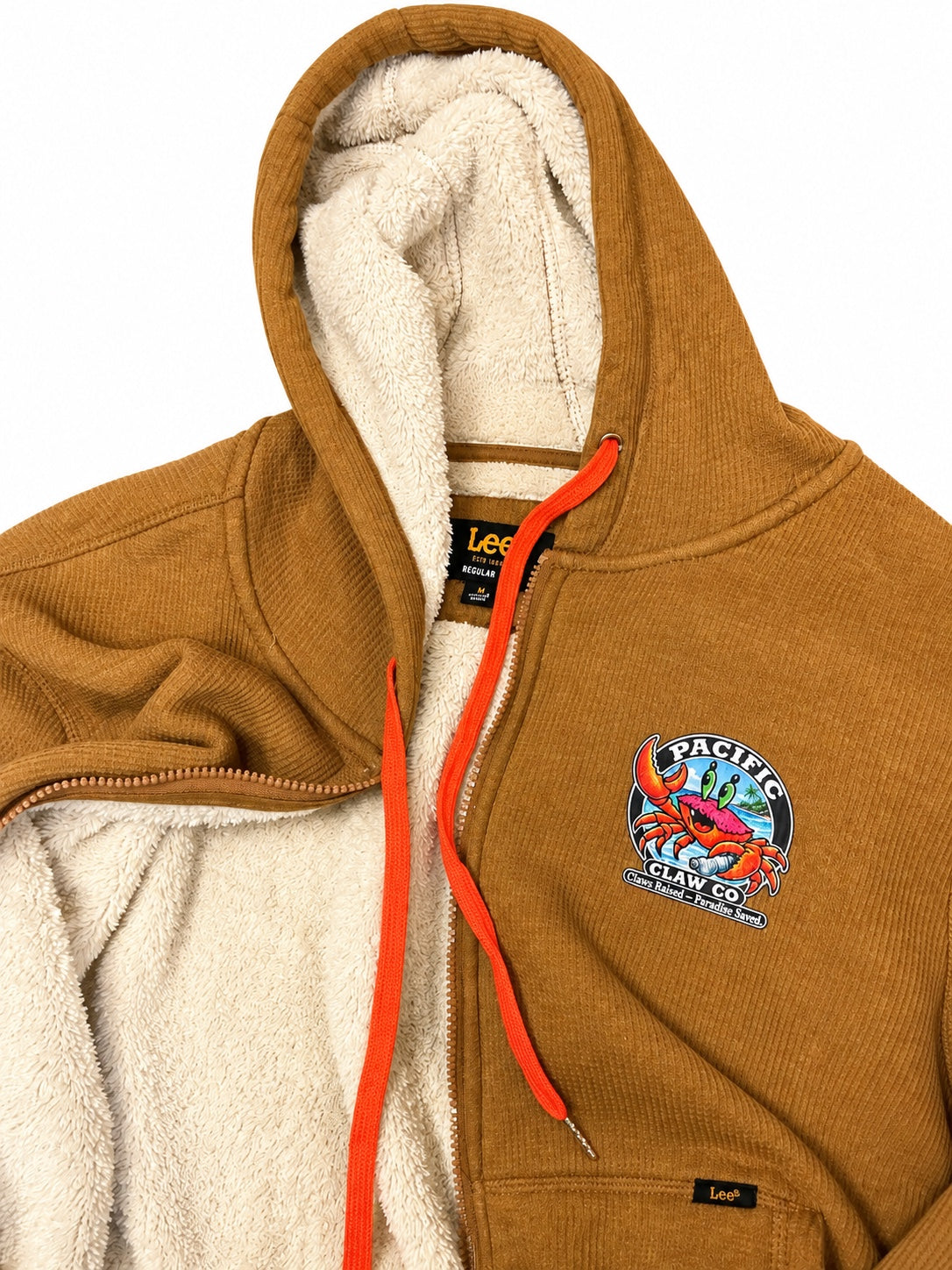 Mustard zip hoodie with Pacific Claw patch and fleece lining